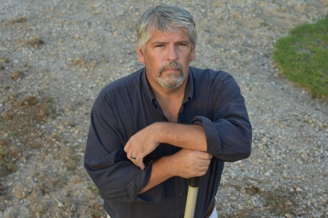 Robert Hassen, father of two, likes to keep busy at his home during the COVID pandemic by getting outside, fixing up his driveway, and making the most out of the last few days of summer in Mount Pleasant, MI. Photo by Paige Hassen.