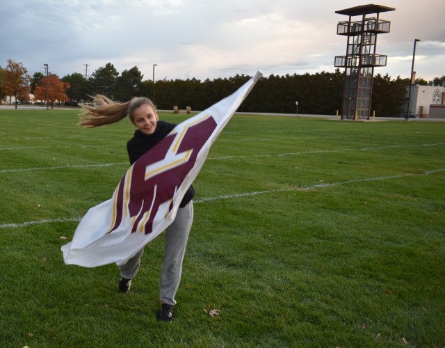 Grace Kennedy, 18, practices her color guard routine for the Central Michigan University marching band.