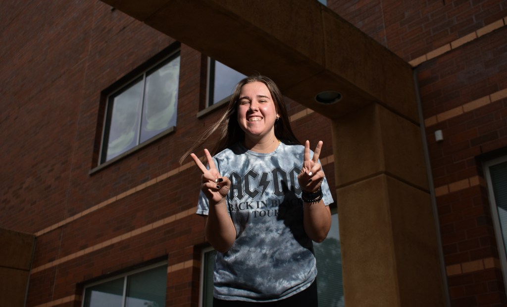 Jodi Balser poses outside of the Charles V. Park Library on the campus of Central Michigan University, Tuesday, October 11, 2022.