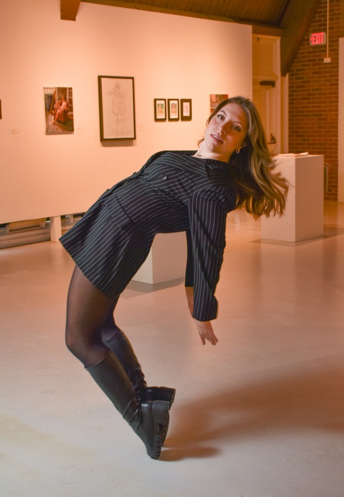 Anna Konen poses inside the Art Gallery on the campus of Central Michigan University, Tuesday, Nov. 15, 2022. Anna is studying fashion merchandising and enjoys modeling.