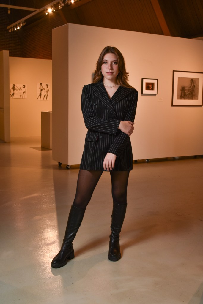 Anna Konen poses inside the Art Gallery on the campus of Central Michigan University, Tuesday, Nov. 15, 2022.