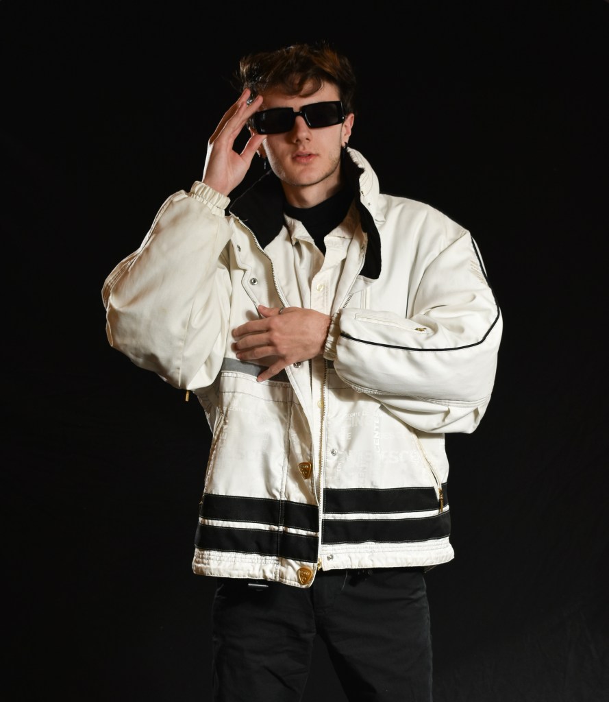 Dylan Clifford poses for a studio fashion portrait in Moore Hall 424 on Wednesday, Nov. 9, 2022.