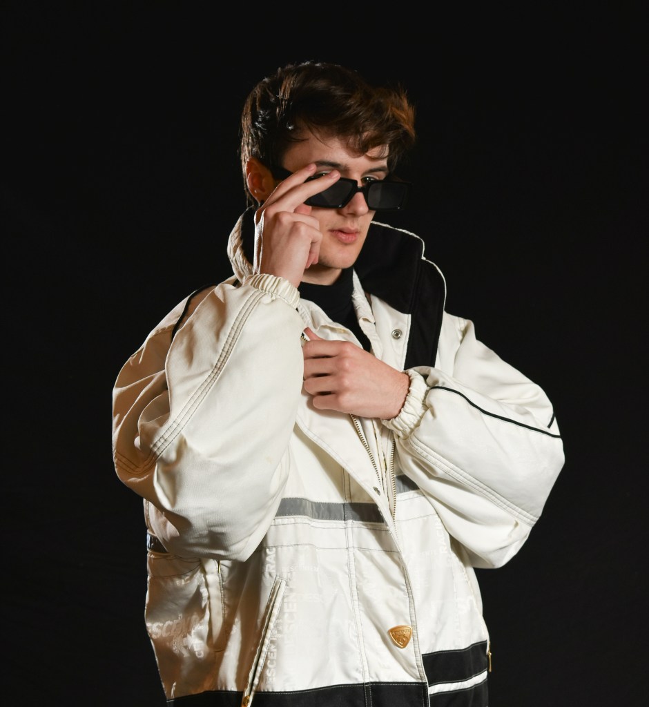 Dylan Clifford poses for a studio fashion portrait in Moore Hall 424 on Wednesday, Nov. 9, 2022.