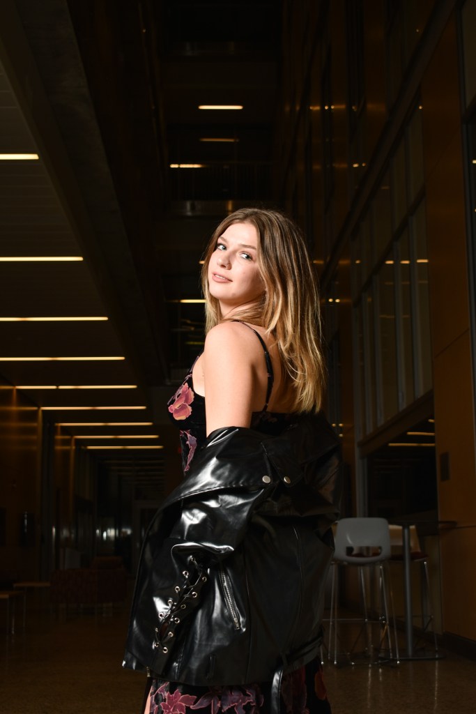 Maggie Petix poses for a fashion shoot on location at the Bioscience Building on the campus of Central Michigan University, Nov. 9, 2022.