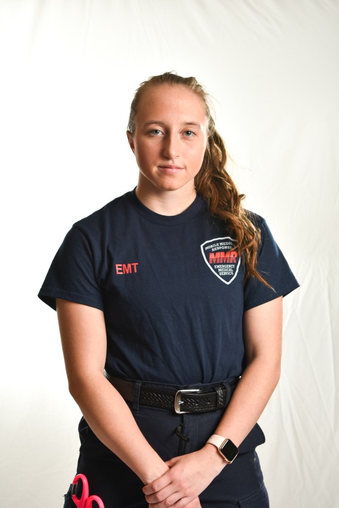 Lauren Revord poses for a portrait in her EMT uniform in Moore Hall on the campus of Central Michigan University on Tuesday, November 1st, 2022.