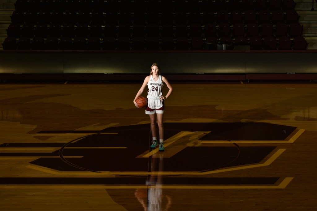 Player Cheveney Koski poses in the middle of the court of McGurik Arena in Mount Pleasant on Wednesday, November 30, 2022.