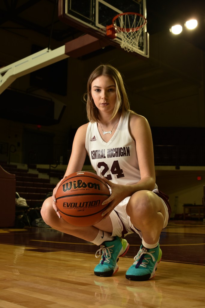 Player Cheveney Koski poses on the court of McGurik Arena in Mount Pleasant on Wednesday, November 30, 2022.